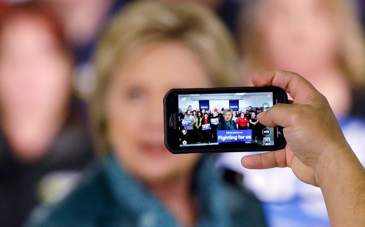 Hillary Clinton is photographed with a cellphone during a campaign event Tuesday in Everett, Wash.