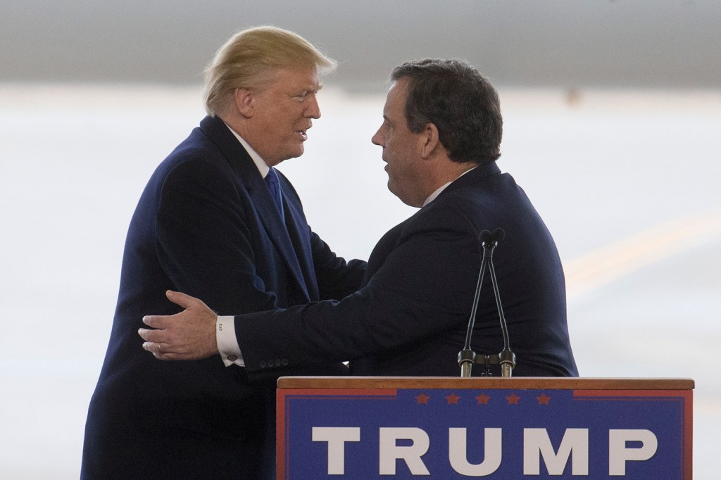 Donald Trump embraces New Jersey Gov. Chris Christie, a former candidate, after being introduced at a campaign stop in Columbus, Ohio, on Tuesday.