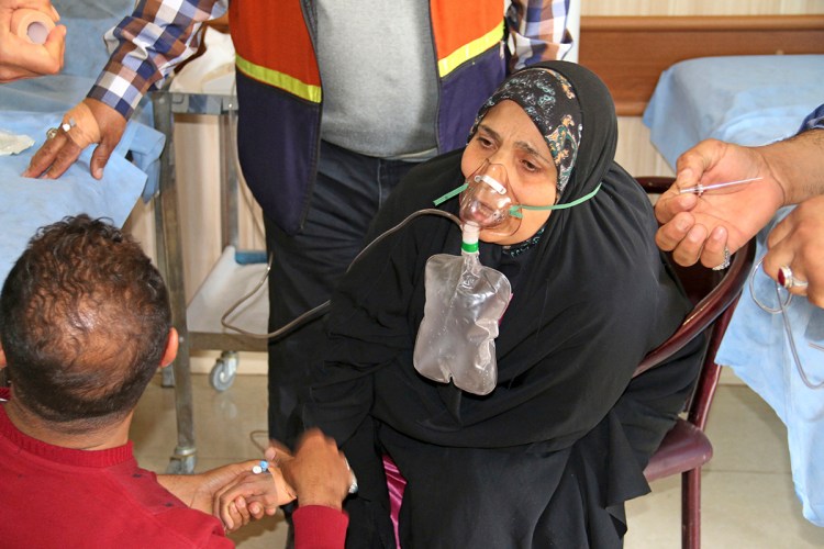 A victim exposed to an apparent chemical attack receives treatment at a hospital in Taza, 10 miles south of Kirkuk in northern Iraq. The Associated Press