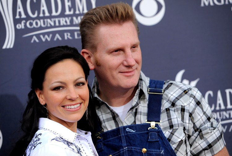 In this April 3, 2011, file photo, Joey Martin Feek, left, and husband Rory Lee Feek, of "Joey + Rory," arrive at the Annual Academy of Country Music Awards in Las Vegas, Nev. Joey died Friday, March 4, 2016, her manager said. The Associated Press
