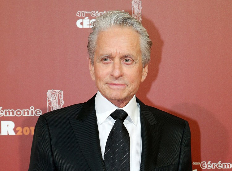 In this Feb. 26, 2016 file photo, U.S actor Michael Douglas arrives at the 41st French Cesar Awards Ceremony, in Paris. Douglas is donating his personal collection of more than three dozen film prints to Rochester’s George Eastman Museum. The Associated Press