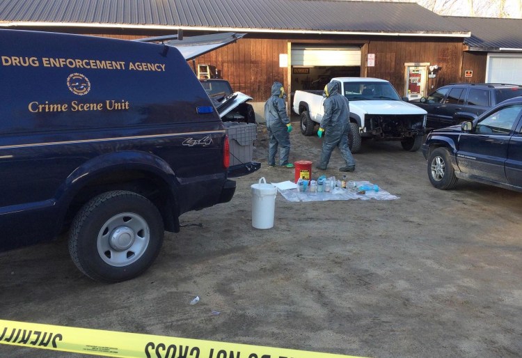 Police investigate the garage in Raymond where they say a meth lab was discovered Tuesday.
Photo courtesy Maine Department of Public Safety