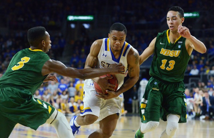South Dakota State's George Marshall, middle, and the Jackrabbits face fifth-seeded Maryland in the first round of the NCAA men's basketball tournament. No. 12 seeds like the Jackrabbits have a history of pulling off first-round surprises.   The Associated Press
