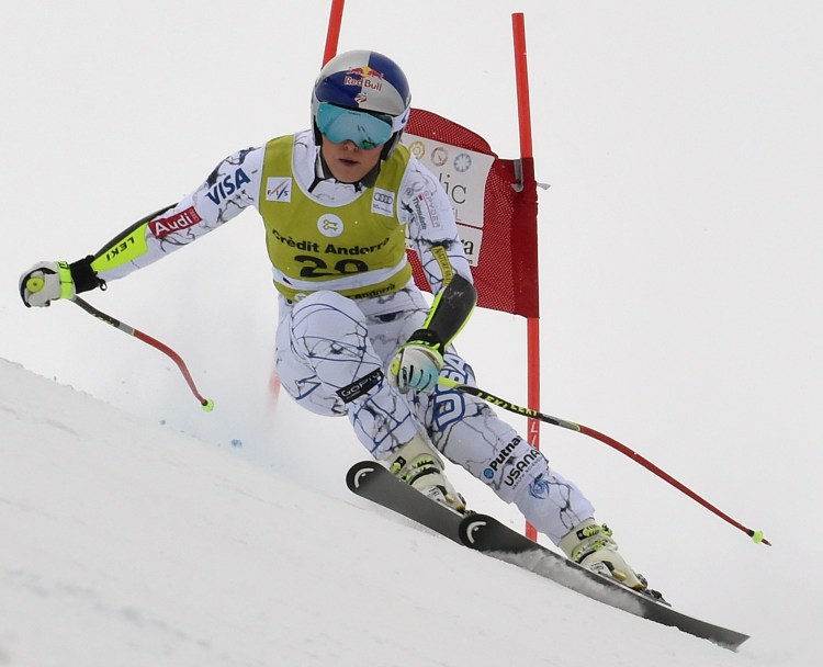 Lindsey Vonn speeds down the course during a women's World Cup, combined race, in Soldeu, Andorra, on Sunday.  She had crashed Saturday in a super-G race and injured her left knee injury.