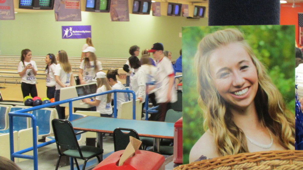 Bowlers take to the lanes last year in a Bowl for Cassidy's Sake fundraiser that raised $36,000 for Big Brothers Big Sisters. Cassidy Charette, seen in foeground photo, was about to become a Big Sister when she was killed in a hayride accident in October 2014. Big Brothers Big Sisters plans to present a posthumous award to her Saturday at the REM Awards 2016, recognizing the community volunteer effort that has blossomed in her memory.