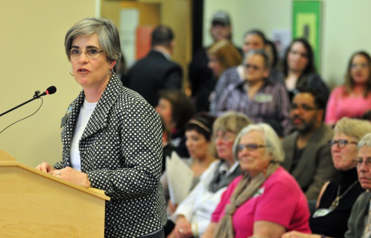 State Sen. Cathy Breen, D-Falmouth, gives personal testimony Friday about the importance of mental health services that are proposed for cuts.
