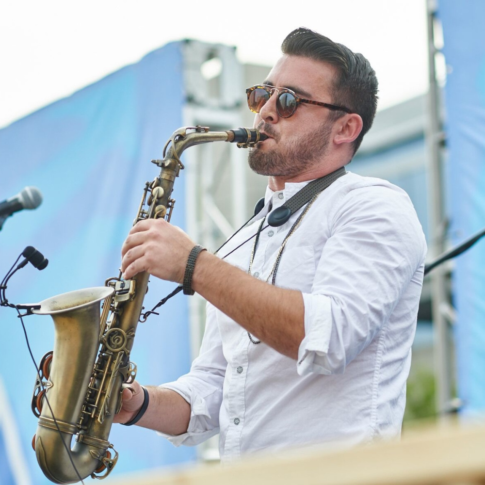 Maine native Devin Ferreira has written a song promoting this year's Boston Marathon. He performs rap and plays saxophone.