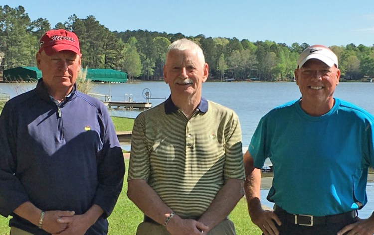 Tom Blake, left, and Tom Moody, center, are each in their 17th year as Masters volunteers, and Tim Bowen is in his 10th year. "It never gets old," Bowen says. Contributed photo