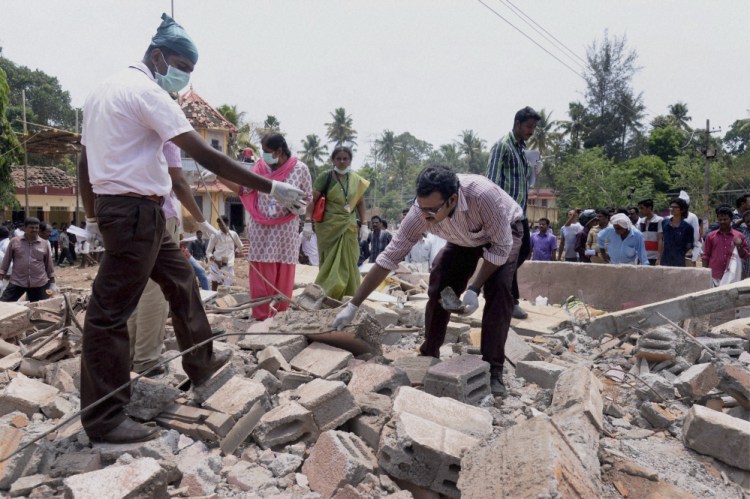 A building collapsed after a massive fire broke out during a fireworks display at the Puttingal temple complex in Paravoor village, north of Thiruvananthapuram, southern Kerala state, India, on Sunday.