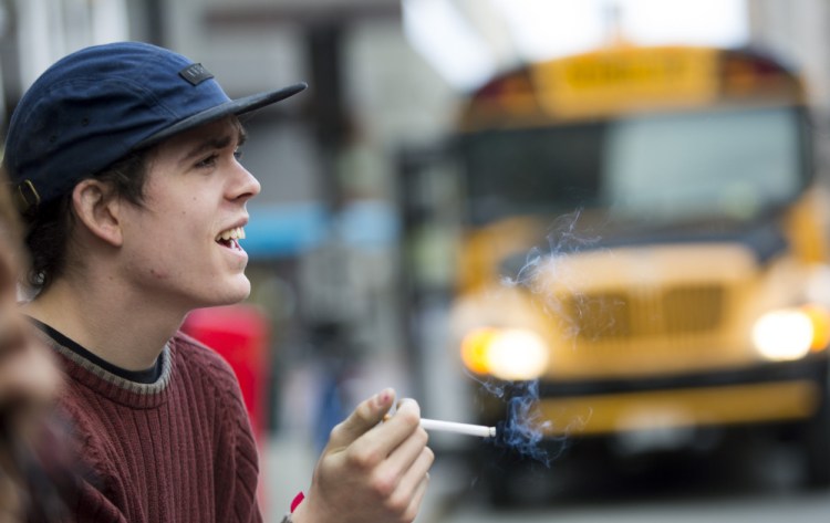 Smokers including Kincaid Pearson, 20, of Portland could be locked out of buying cigarettes in the city if the council raises the minimum age to 21.