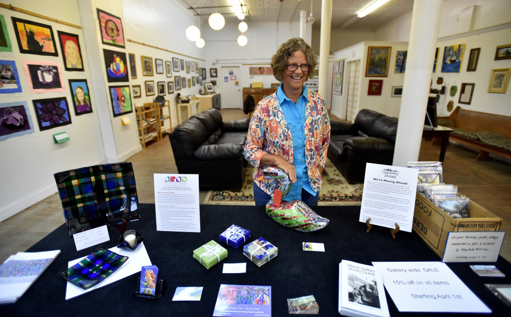 Mardy Bogar in Upcountry Artists Gallery and Learning Center on Friday in Farmington. The gallery is closing at the end of April after three years of operating downtown.