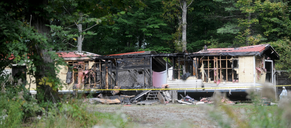 Matthew Short was charged with the fire that destroyed this mobile home in Canaan in September.