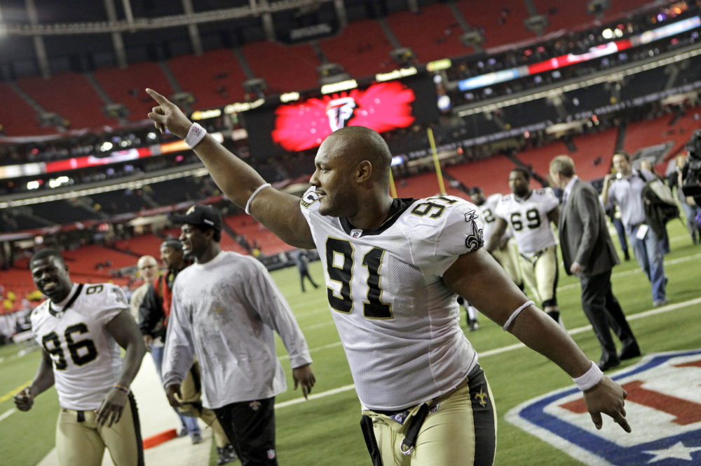 New Orleans Saints defensive end Will Smith (91) celebrates a 17-14 win over the Atlanta Falcons in a game in Atlanta.
