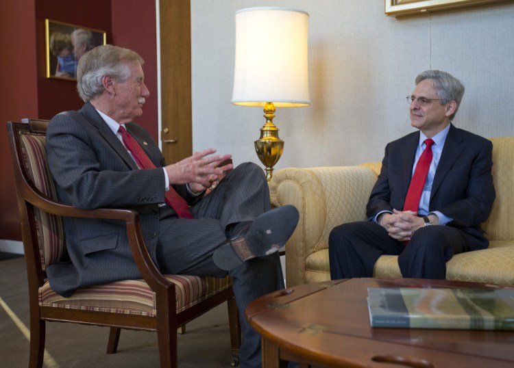Judge Merrick Garland, President Obama's choice to replace the late Justice Antonin Scalia on the Supreme Court, meets with Sen. Angus King of Maine on Capitol Hill on Wednesday.