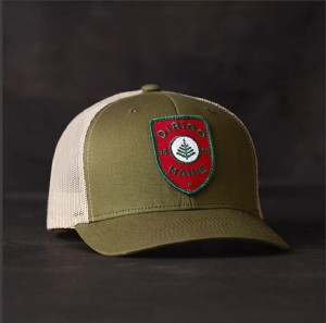 A baseball cap in the Dirigo line of products developed by Might & Main.