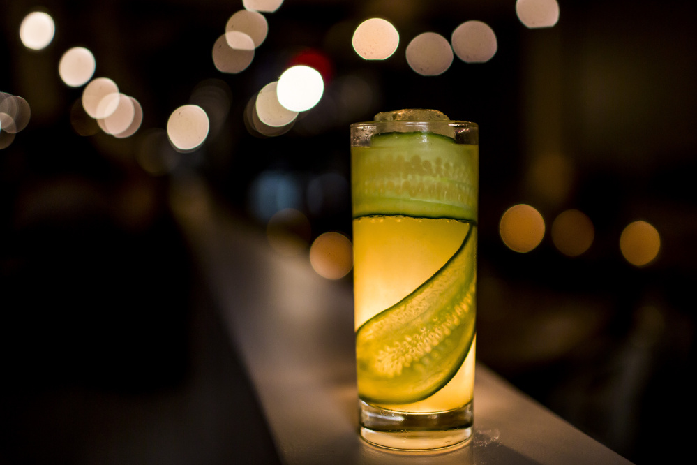 The Salato Highball features house-infused spicy tequila, Strega, lime juice and a cucumber garnish.