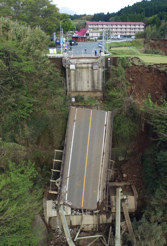 Aso Bridge is seen collapsed by a powerful earthquake in Minamiaso village, Kumamoto prefecture, Japan, Sunday.