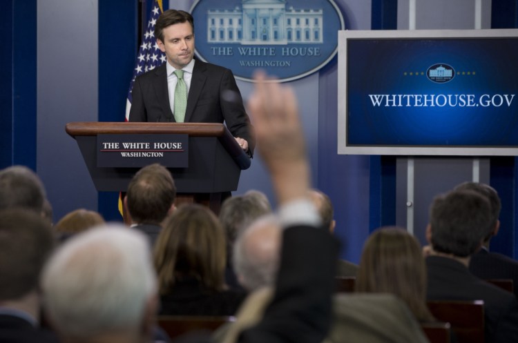 White House press secretary Josh Earnest takes questions during the daily briefing at the White House in 2014.