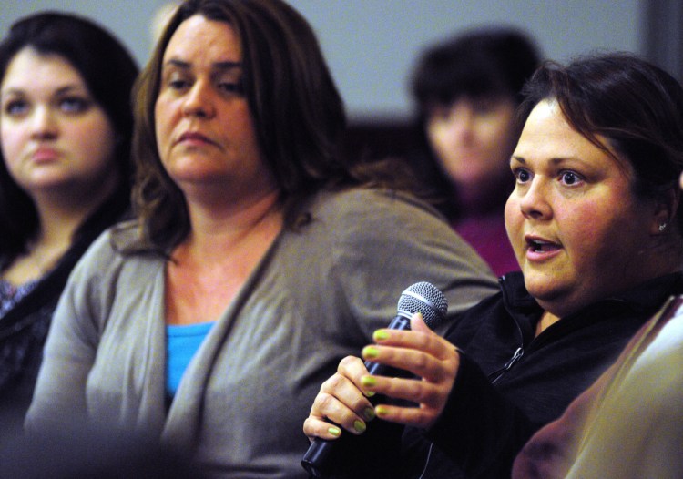 Jodi French, right, who works as an acuity specialist at Riverview Pyschiatric Center, speaks on Jan. 19 during a meeting between Riverview workers and state legislators at the University of Maine at Augusta. The Legislature passed a bill that will give pay raises to Riverview employees.