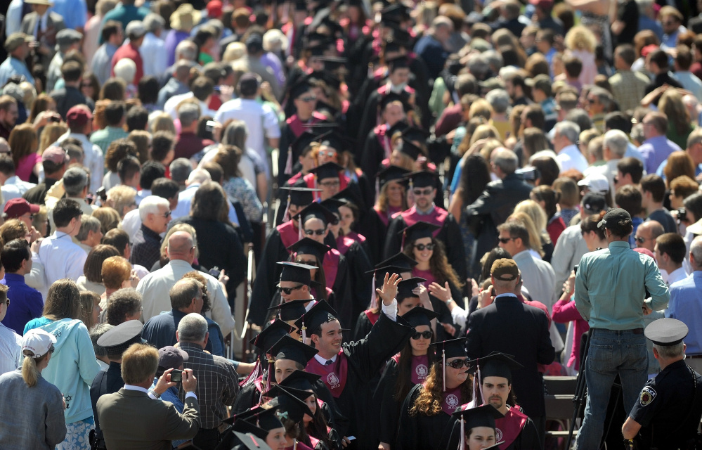 University of Maine at Farmington graduates process to their seats during the 2014 commencement ceremonies in Farmington.