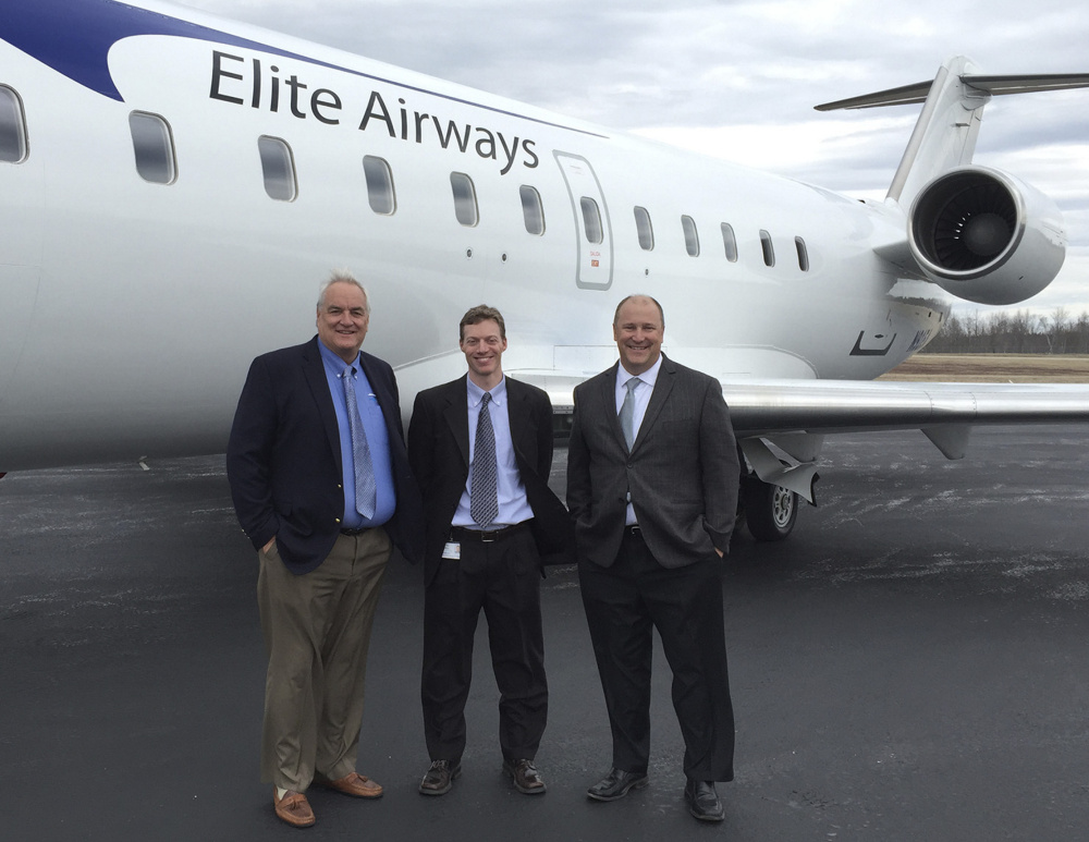 John Pearsall, left, president of Elite Airways, is joined by Brad Madeira, Hancock County-Bar Harbor Airport director, and Dave Dow, vice president of sales at Elite Airways.
