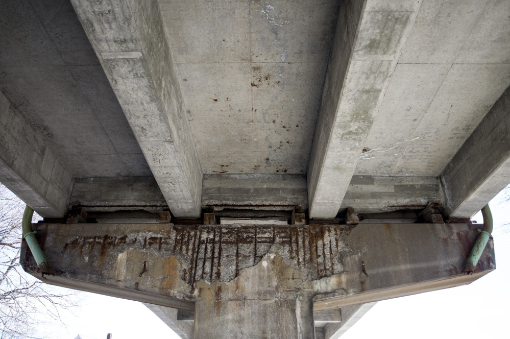Corrosion was visible under the supports for the Bath viaduct in  2016, before the replacement project began. At the time, the Maine Department of Transportation said the bridge was safe, but added wooden blocks to reinforce the support.