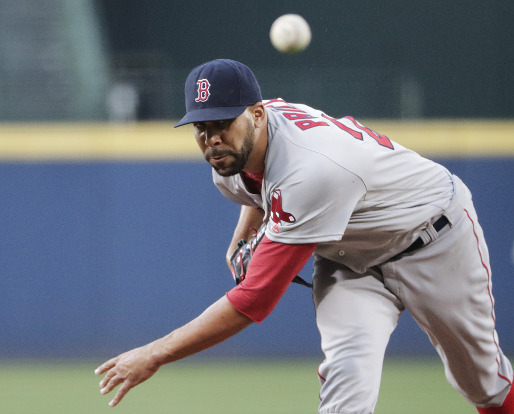 Red Sox starting pitcher David Price throws in the first inning.