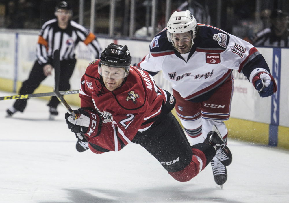 Mike Matheson, left, will be on the ice again Thursday night for the Portland Pirates at Hershey after playing five games for the Florida Panthers in the NHL playoffs.
