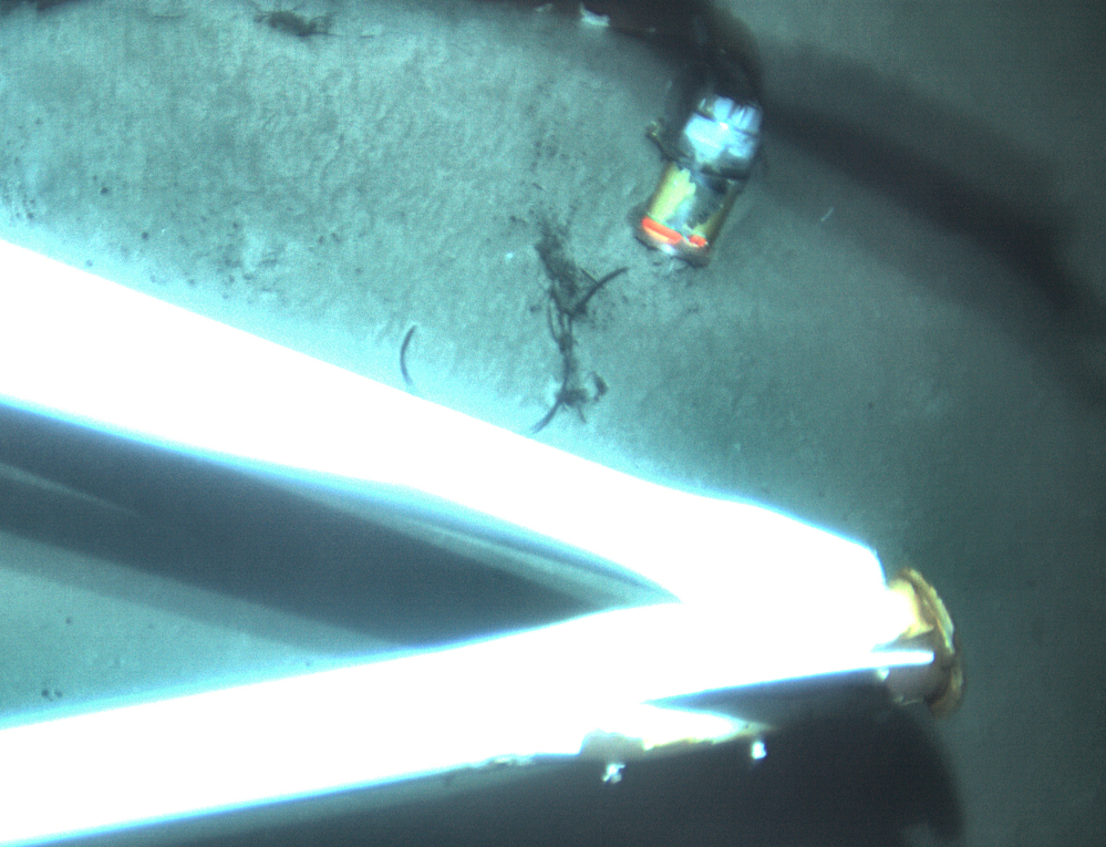 This undated image made from a video and released Tuesday by the National Transportation Safety Board shows the data recorder, top right, of the sunken ship El Faro. The data recorder was located northeast of Acklins and Crooked Islands, Bahamas.