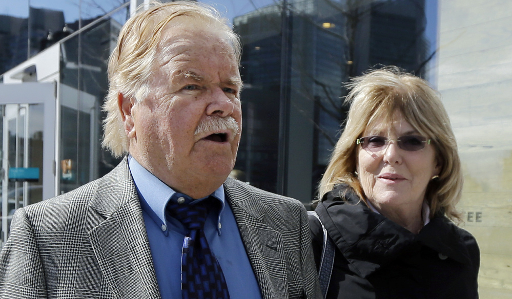 Robert Fitzpatrick walks from federal court in Boston April 30, 2015, with his wife, Jane. At that time, Fitzpatrick pleaded not guilty to charges of perjury during James "Whitey" Bulger's trial but he is expected to change his plea.