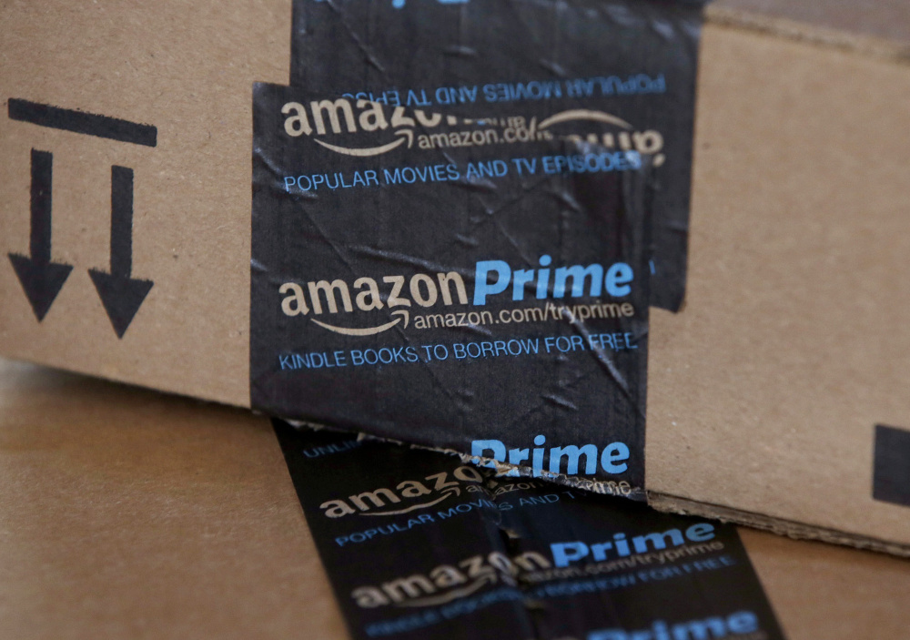 Amazon Prime boxes are stacked up in Phoenix. Amazon Prime, the company's $100 annual membership program, is now a decade old.
