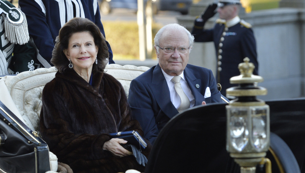 Thousands of Swedes lined the streets as Queen Silvia and King Carl XVI Gustaf rode through Stockholm on Friday as part of a celebration of the king's birthday.