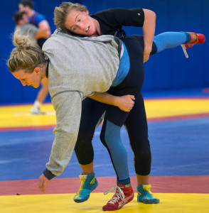 Deanna Betterman, top, practices takedowns with Haley Augello during practice Tuesday at the Olympic Training Center in Colorado. The Gazette/Christian Murdock/Special to the Press Herald