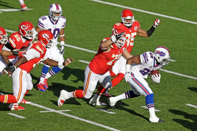 Kansas City Chiefs defensive end Mike DeVito (70) tackles Buffalo Bills running back Fred Jackson after a short gain during a Nov. 3, 2013, game in Orchard Park, N.Y. The Chiefs won 23-13. The Associated Press
