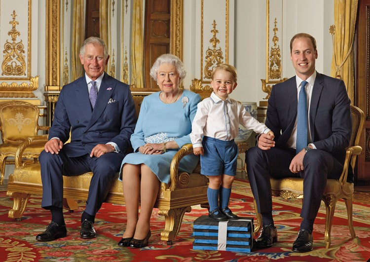 In this photograph taken in 2015 but released  Wednesday, Britain's Prince George stands on foam blocks during a photo shoot  in the White Drawing Room at Buckingham Palace.  The image features four generations of the royal family, from left, Prince Charles, Queen Elizabeth II, Prince George and Prince William, the Duke of Cambridge. Ranald Mackechnie/Royal Mail via AP