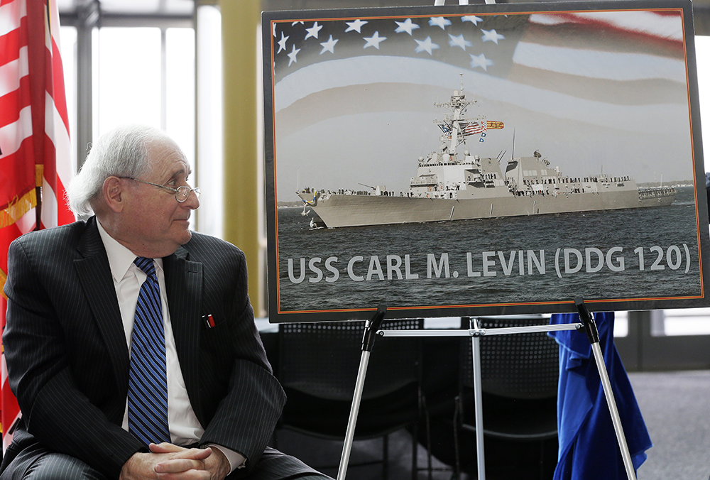 Former U.S. Sen. Carl Levin watches the unveiling of a photo of the USS Carl M. Levin during a ceremony Monday in Detroit. The Associated Press