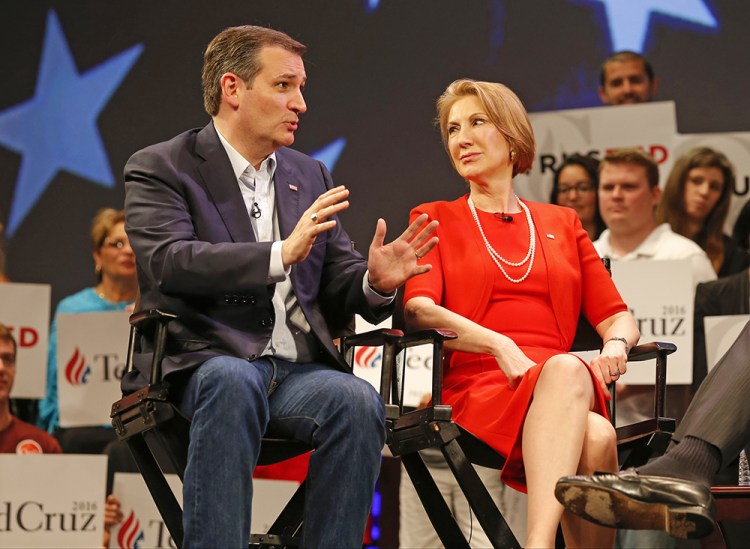 Republican presidential candidate Ted Cruz talks with Carly Fiorina at a March 11, 2016, campaign appearance in Orlando, Fla. The 61-year-old Fiorina, a former chief executive of Hewlett-Packard, has been a prominent Cruz ally since shortly after abandoning her own presidential bid earlier in the year. The Associated Press