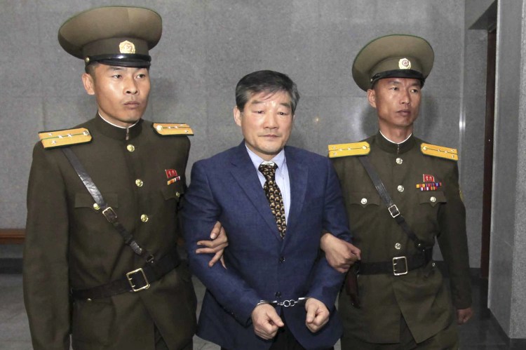 Kim Dong Chul is escorted to his trial on April 29, 2016, in Pyongyang. A North Korean court sentenced the Korean-American to 10 years in prison for what it called acts of espionage. 