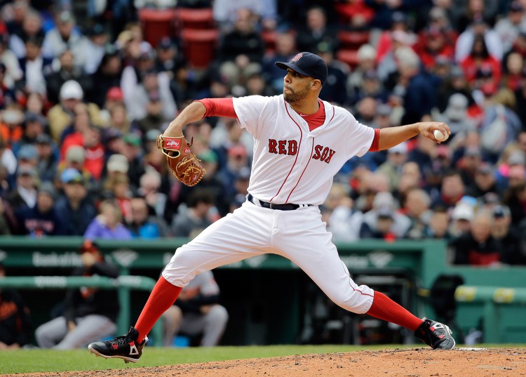 Boston Red Sox starting pitcher David Price delivers against Baltimore on opening day at Fenway Park. He lasted just five innings and gave up five runs.