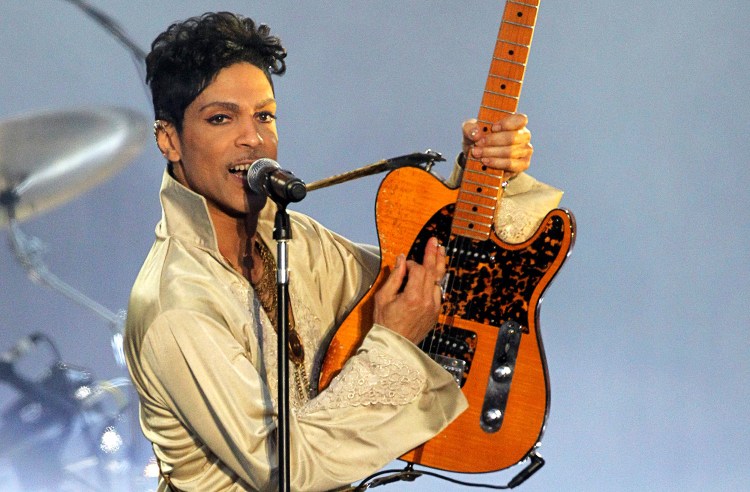 Prince performs at the Hop Farm Festival near Paddock Wood, southern England, in this July 3, 2011, photo. His death came less than a week after his plane made an emergency stop in Moline, Illinois, for medical treatment as he was returning from an Atlanta concert. The Associated Press and other media reported, based on anonymous sources, that Prince was found unconscious on the plane, and first responders gave him a shot of Narcan, an antidote used in suspected opioid overdoses.