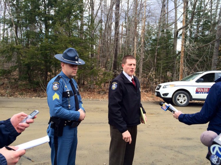 Lt. Jeff Love, left, and Sgt. Jason Richards of the Maine State Police Major Crimes Unit talk about the arrest of Jeremy Erving in the shooting death of his uncle, Randy Erving, in St. Albans on Friday. 