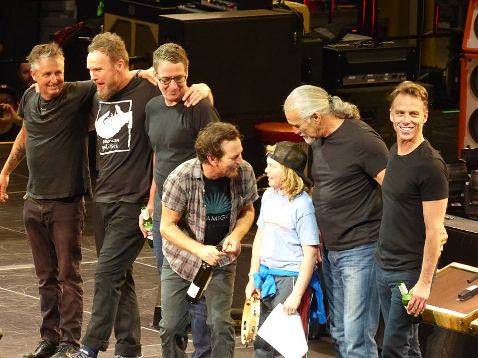Noah Keeley of Bar Harbor chats with Eddie Vedder and other members of Pearl Jam during a show in Quebec City. The band invited Noah onstage to play the song “Sad” with them. The Keeley family has since been inundated with photos and video clips of the performance from other fans.