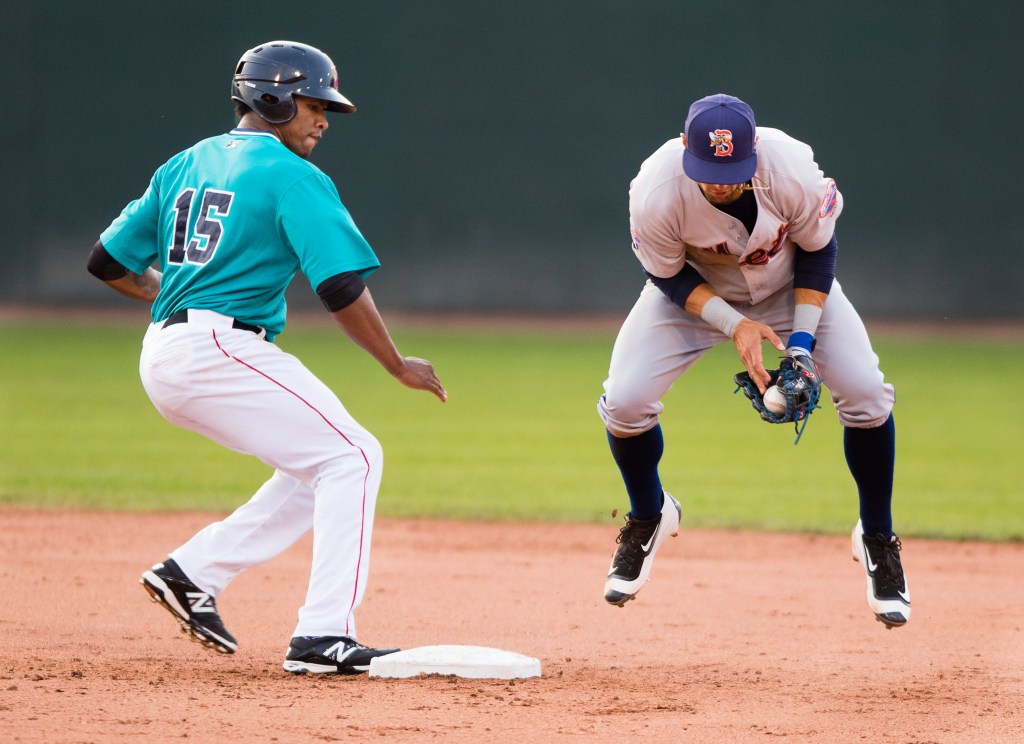 Rainel Rosario of the Sea Dogs gets back to second as Binghamton  infielder L.J. Mazzilli tries to handle the throw in the fifth inning Thursday at Hadlock Field.
Carl D. Walsh/Staff Photographer