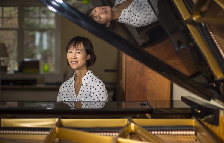 Tess Gerritsen, who plays piano and violin, composed the song "Incendio" for her latest book, "Playing with Fire," about a violinist who finds a mysterious piece of sheet music in Italy that she believes is imbued with mysterious powers.
