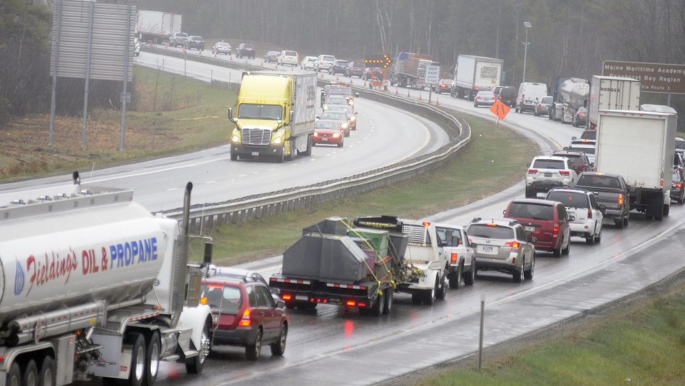 Both northbound lanes of the Maine Turnpike reopened at 11:15 a.m. Monday in Farmingdale following a tractor-trailer accident that delayed traffic for 10 hours.