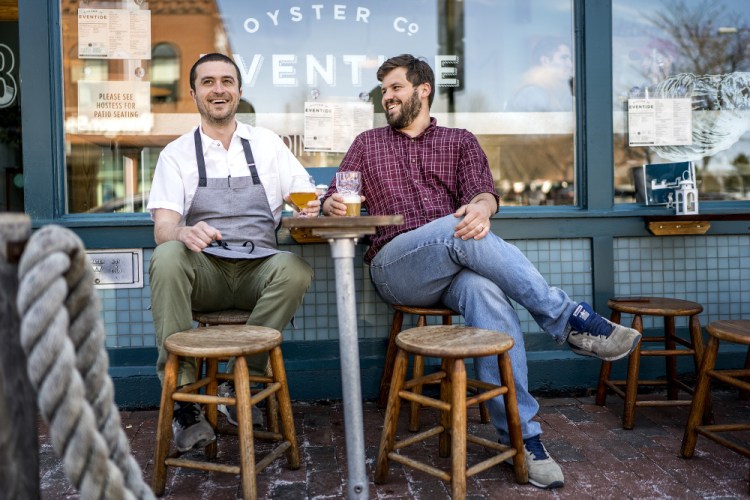 Mike Wiley and Andrew Taylor, shown in 2016 outside their Eventide Oyster Co. on Fore Street in Portland, have won the James Beard Award for Best Chef: Northeast, it was announced Monday. 