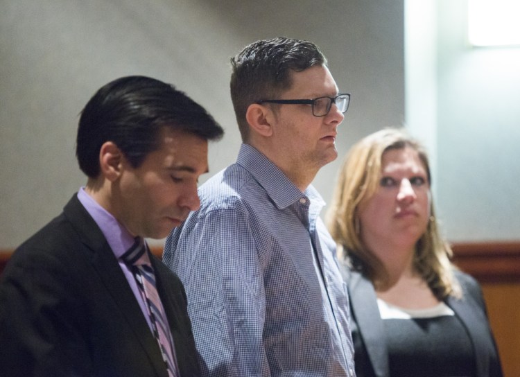 Noah Gaston, 33, of Windham pleads not guilty to charges of murder and manslaughter for shooting his wife, Alicia Gaston, to death in their home. Besides his attorneys, Luke Rioux, left, and Temma Donahue, right, no one attended Tuesday's hearing in support of Gaston.