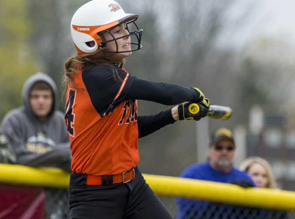 Grace Martin of Biddeford follows through on one of her two hits for Biddeford, driving in two runs against Thornton Academy at Saco.