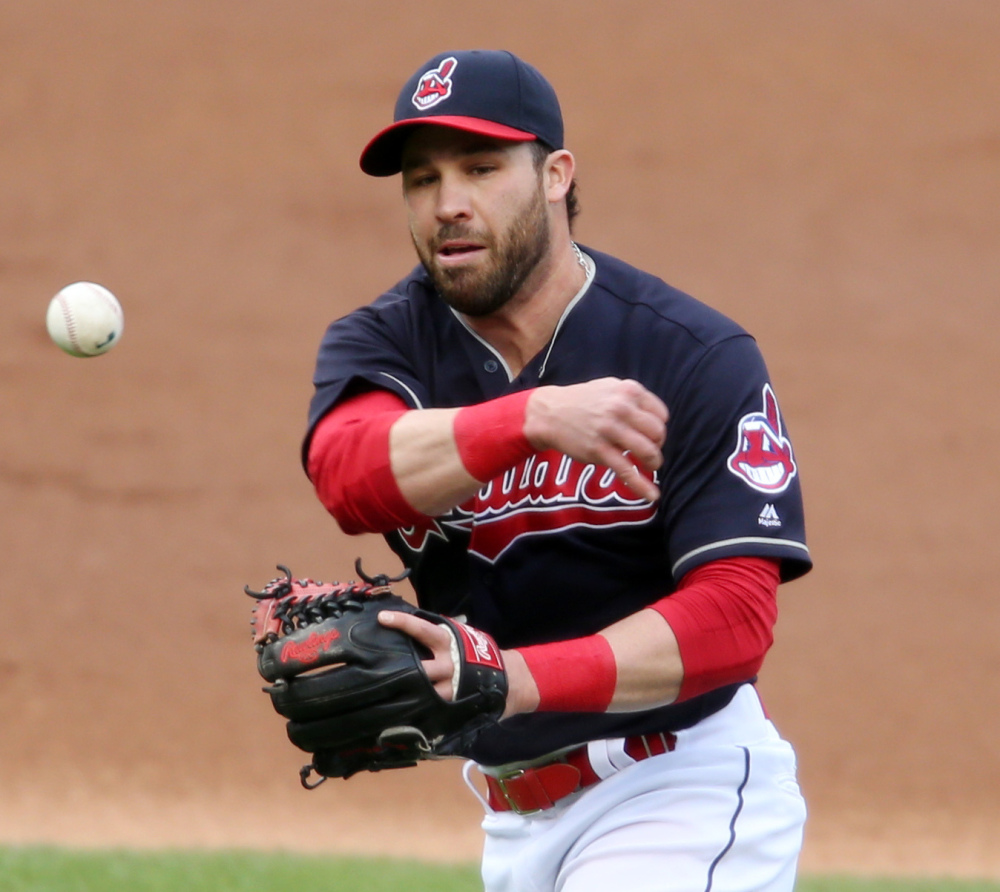 Cleveland second baseman Jason Kipnis throws out Detroit's Justin Upton during the Indians' 4-0 win at home on Thursday night.