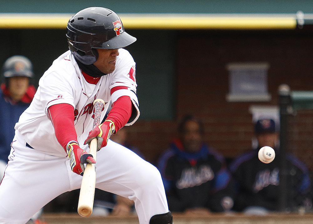 Wendell Rijo of the Portland Sea Dogs fails to get a bunt to land in fair territory Thursday during the first inning of the 2-1 victory against the Binghamton Mets at Hadlock Field. Binghamton had won 14 straight games in Portland.
